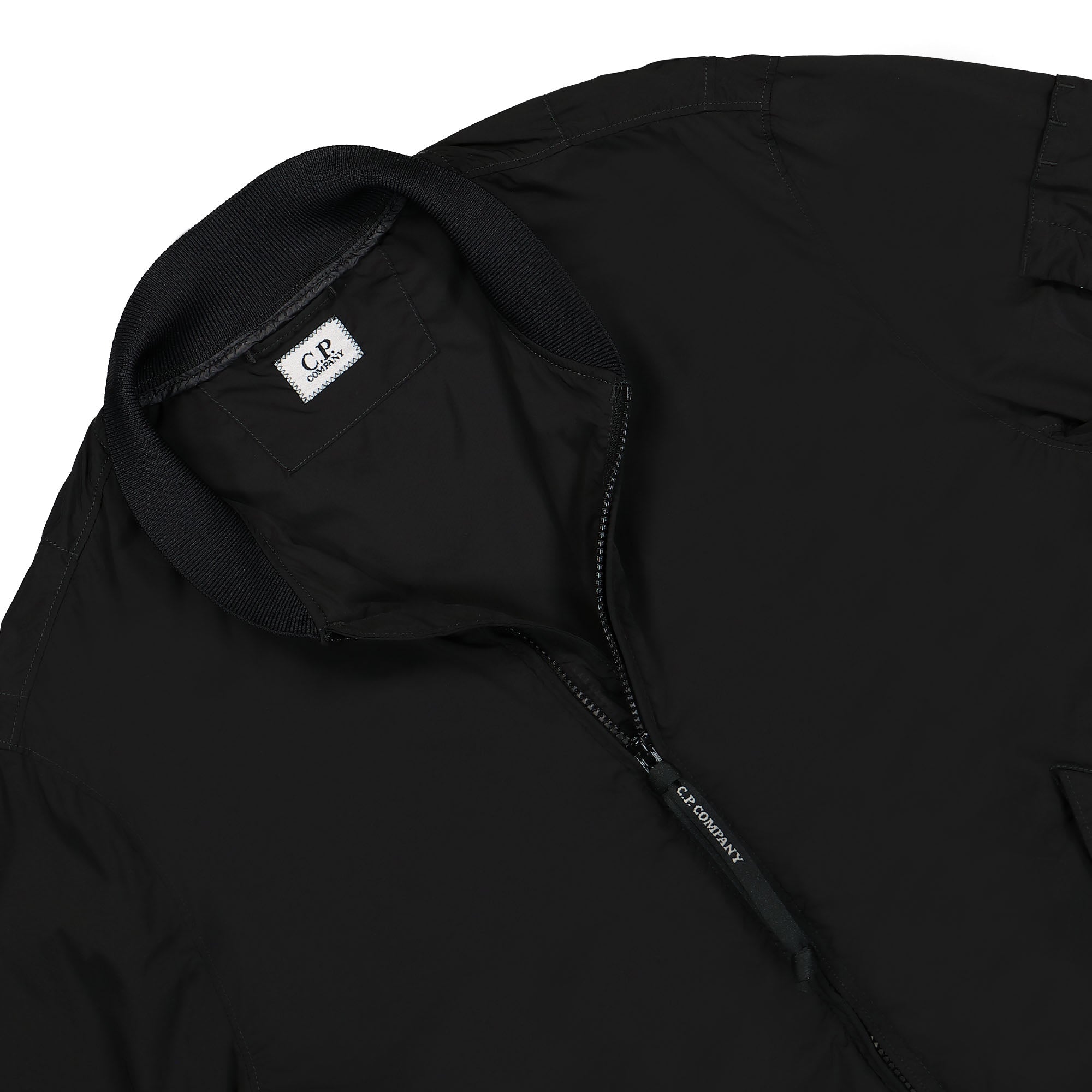 C.P. Company Nycra-R Bomber Jacket Black Bomber & Varsity Jackets Close-up | Overkill