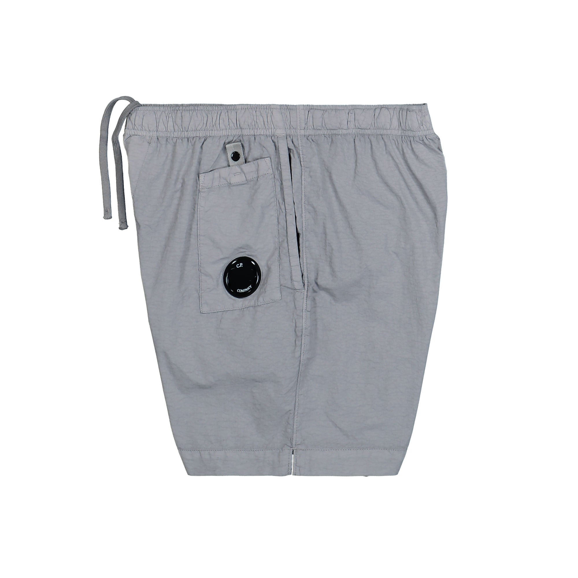 C.P. Company Lens Swim Shorts Limestone Swimwear Close-up | Overkill