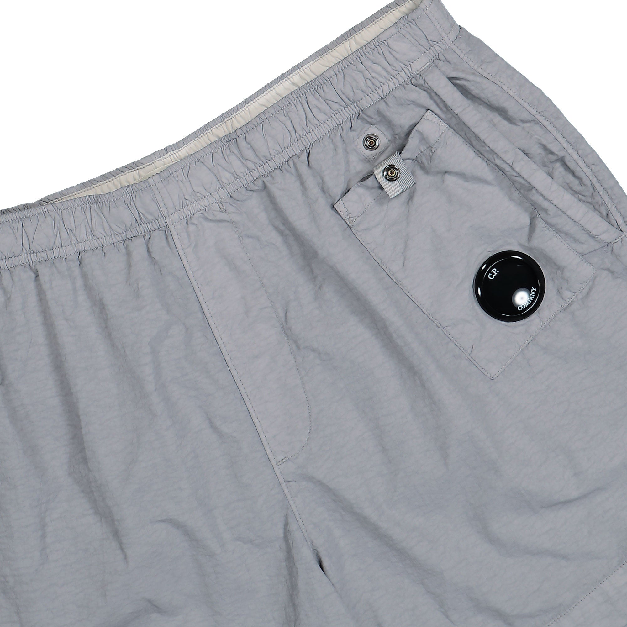 C.P. Company Lens Swim Shorts Limestone Swimwear Detailfoto | Overkill