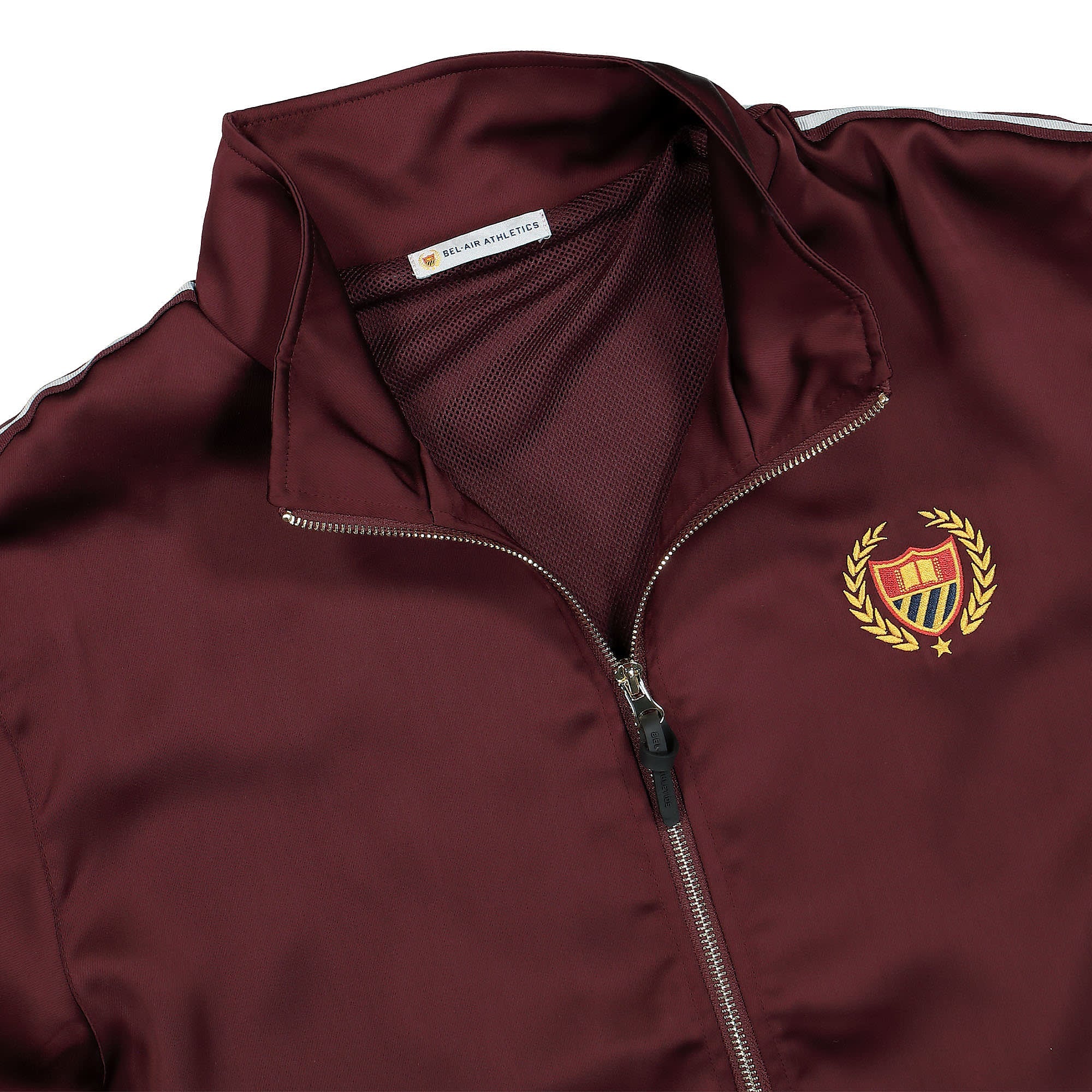 Bel-Air Athletics Academy Embroidered Logo Crest Tracksuit Top Burgundy Track Jackets Close-up | Overkill