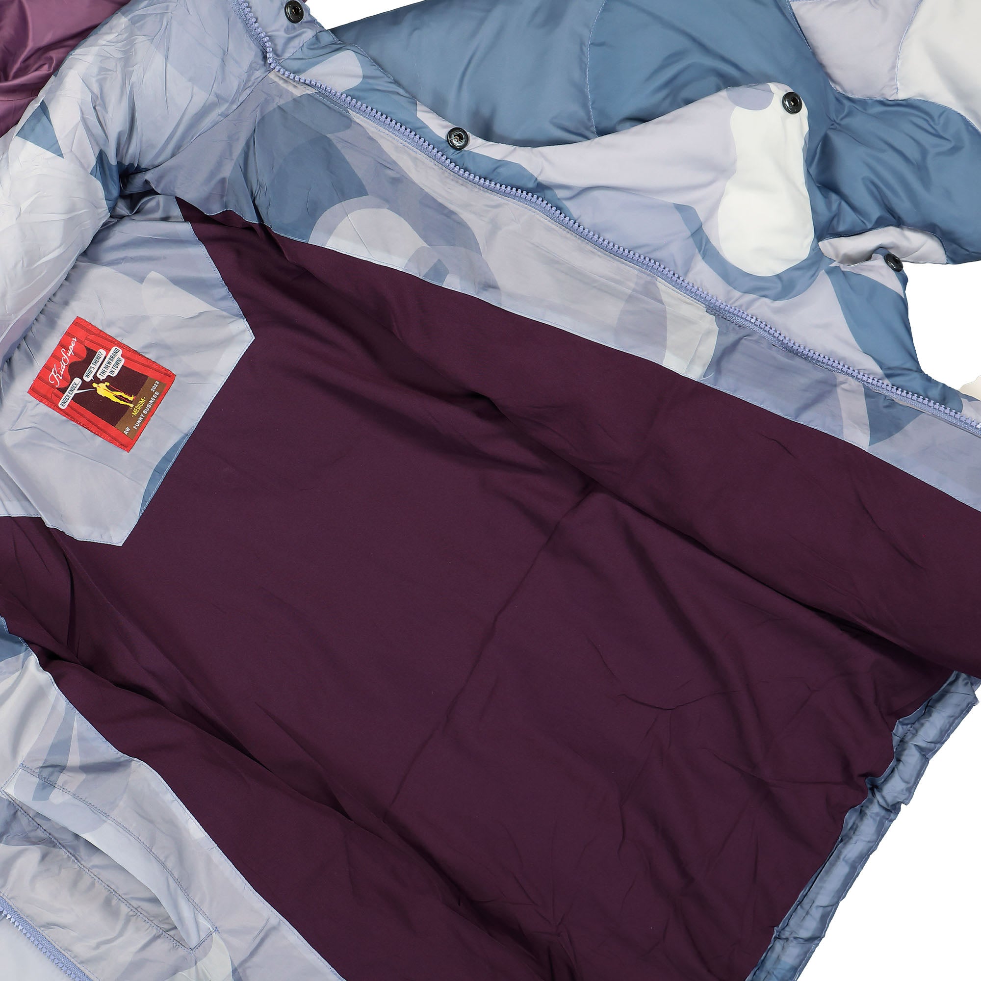 Kidsuper Studios Kissing Puffer Jacket Blue Puffer Jackets Detail view 1 | Overkill