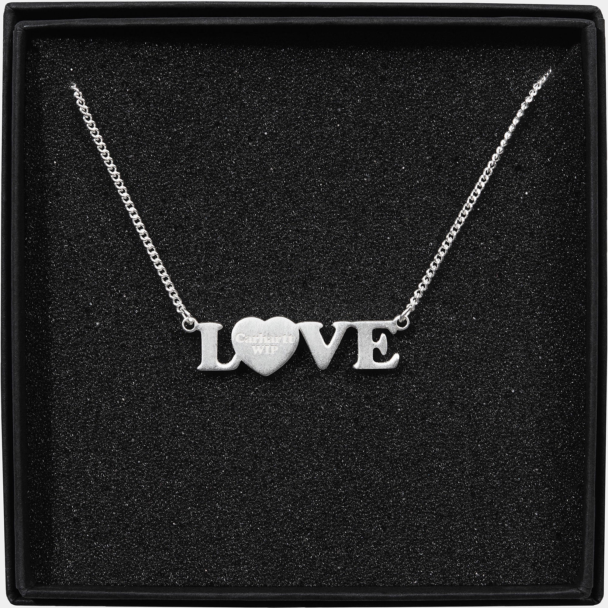 Carhartt WIP Love Pendant Necklace Silver Jewelry Close-up | Overkill