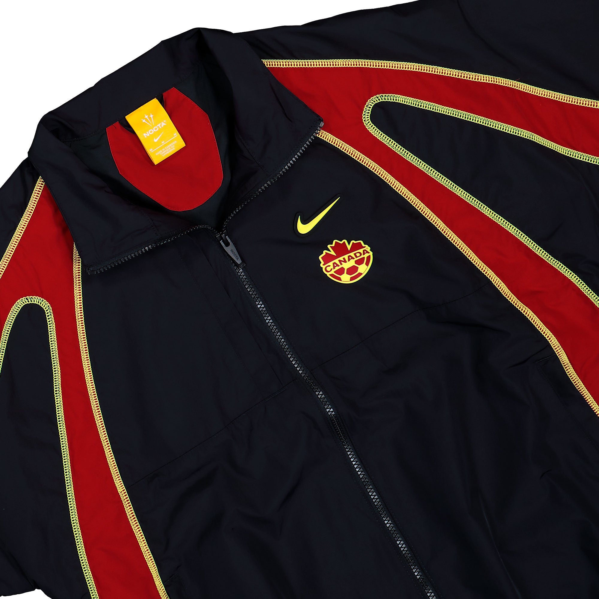 NOCTA x Nike Canada Soccer Track Jacket Black / Gym Red / Sonic Yellow / Sonic Yellow Track Jackets IM3235 010 Detail View 1 | Overkill