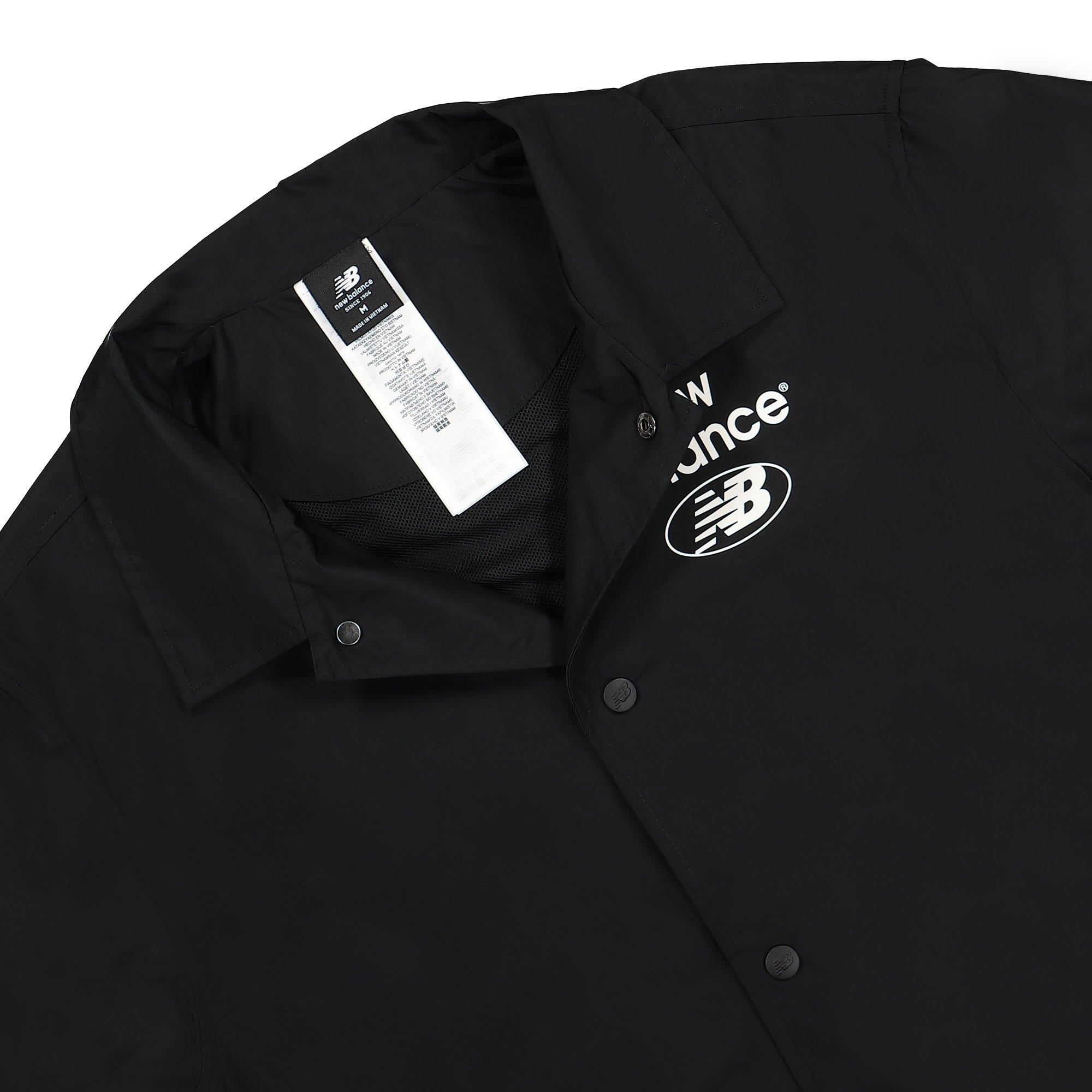 New Balance Essentials Coach Jacket Black Jackets Close-up | Overkill