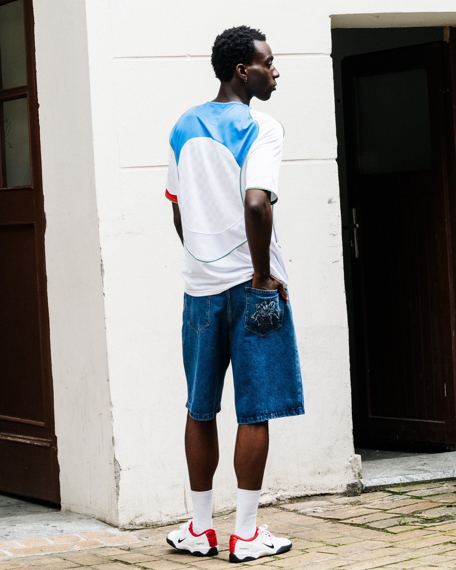 Nike T90 Dri-Fit Energy Jersey White / Italy Blue / Sport Red / Metallic Gold T-Shirts IB4210 100 On Model Back View | Overkill