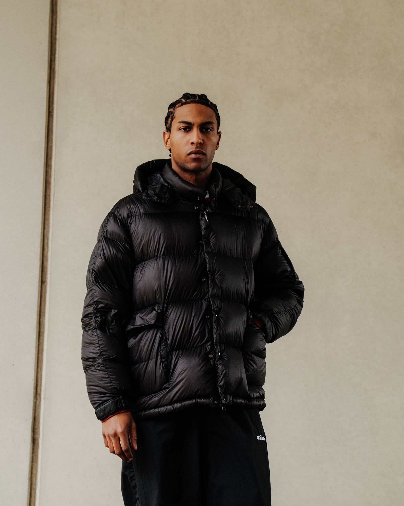 C.P. Company DD Shell Hooded Medium Down Jacket Black Puffer Jackets 19CMOW191A-110416A 999 On Model Front View | Overkill