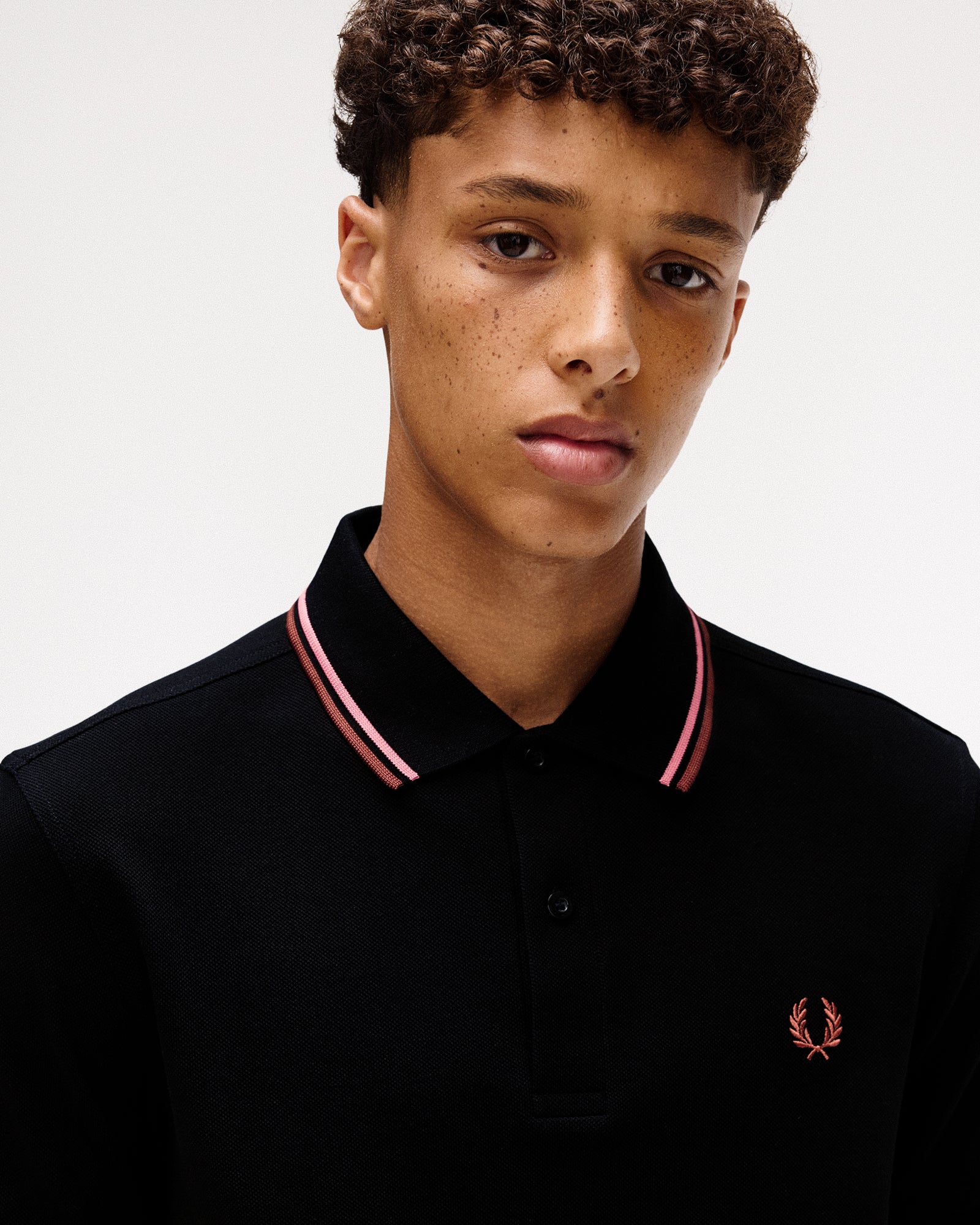 Fred Perry Twin Tipped Fred Perry Shirt Black / Putty Pink / Whisky Brown Polo Shirts Detail view 1 | Overkill