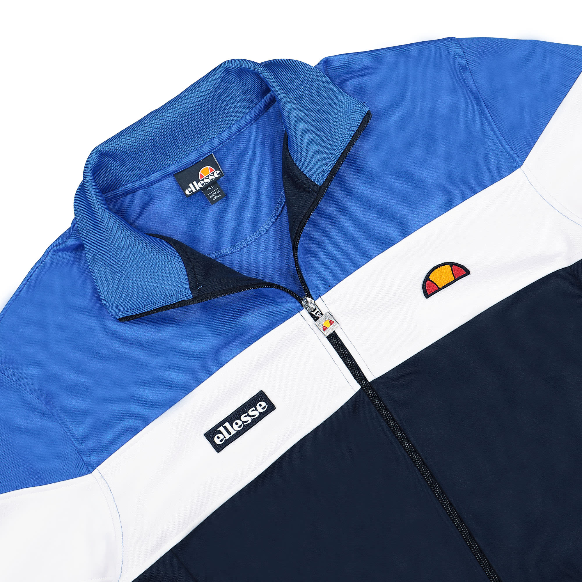 Ellesse Caprini Track Top Blue / Navy / White Track Jackets Close-up | Overkill
