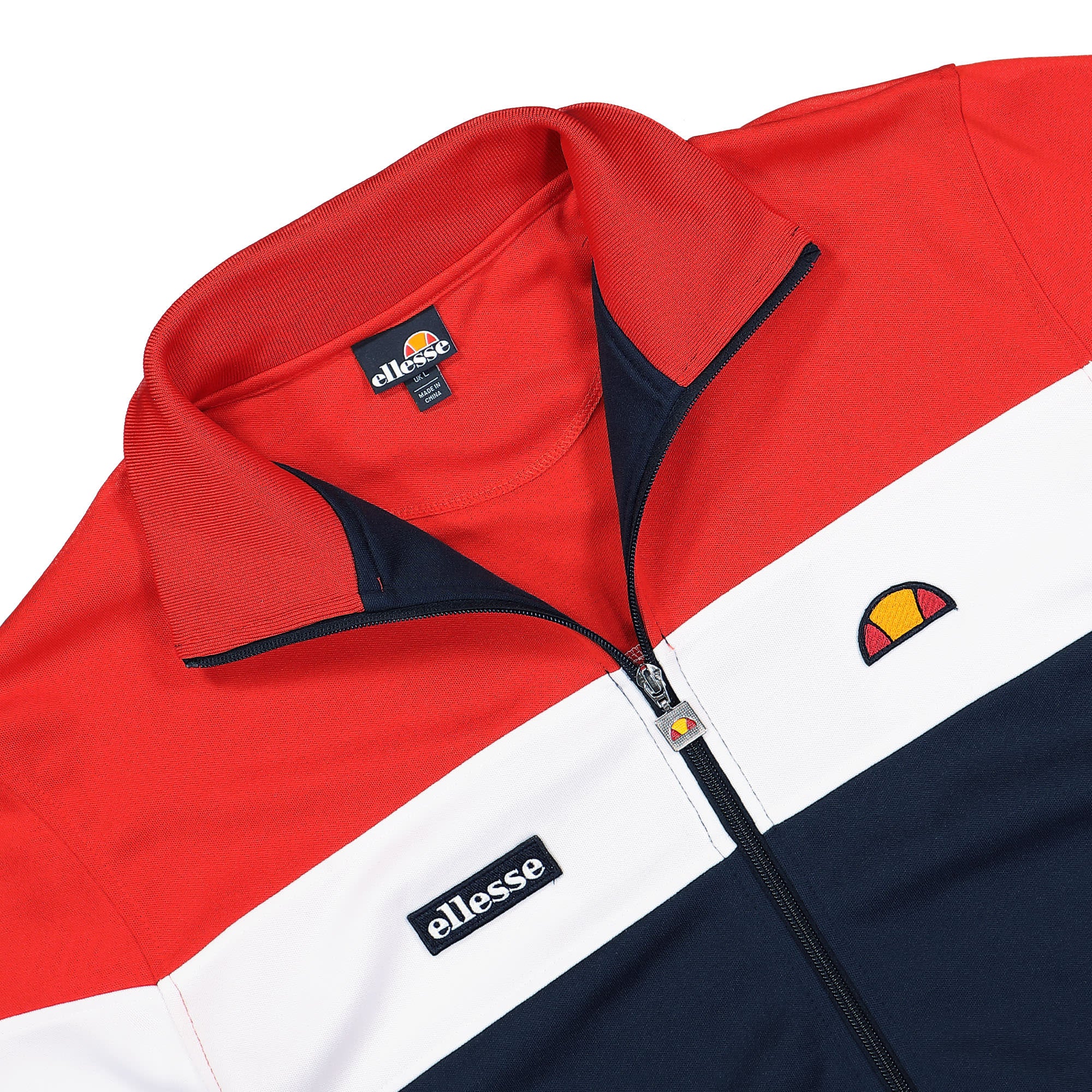 Ellesse Caprini Track Top Red / Navy / White Track Jackets Close-up | Overkill