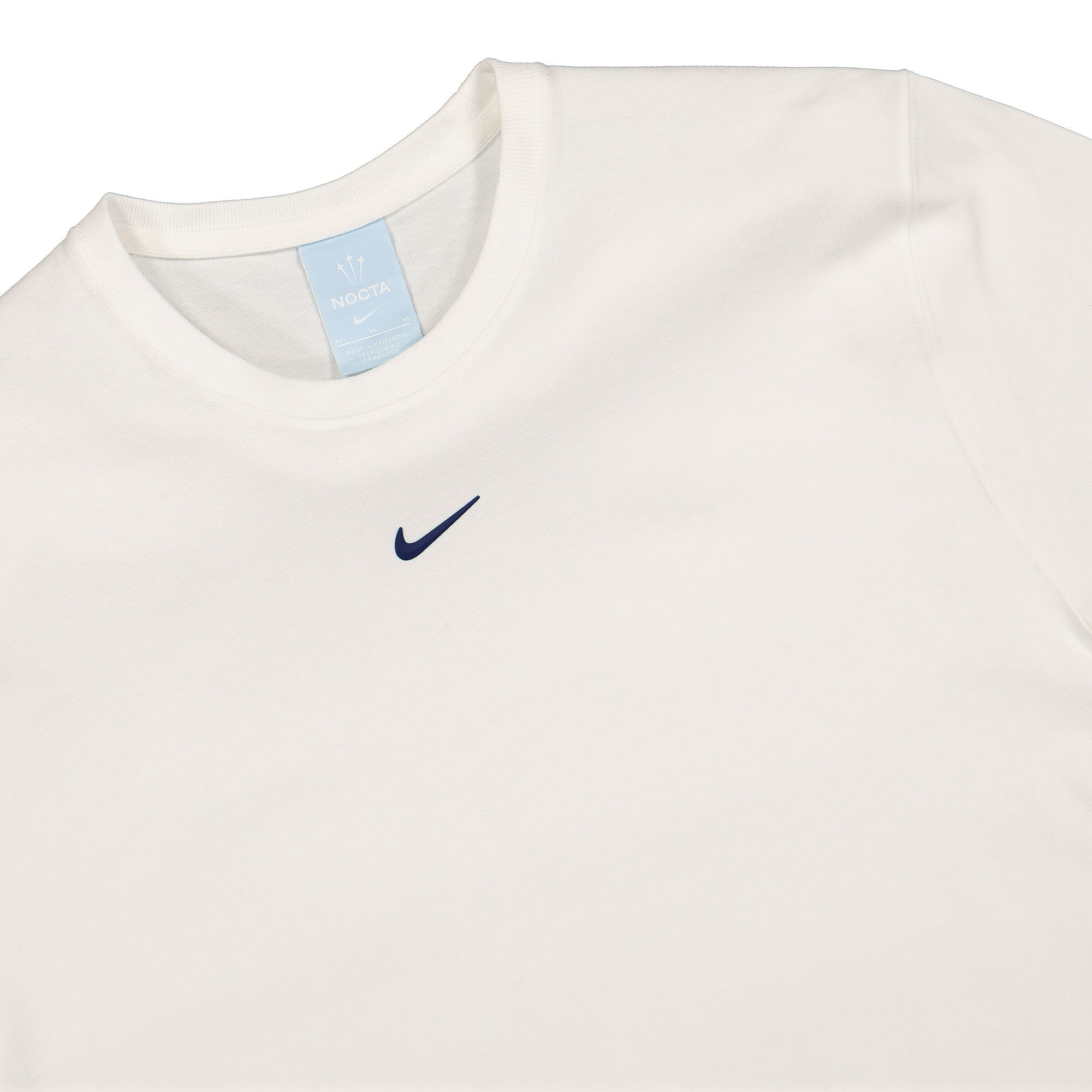 Nike NRG Nocta AU Essential Graphix Short Sleeve Top 1 White / Blue Void Tops Close-up | Overkill