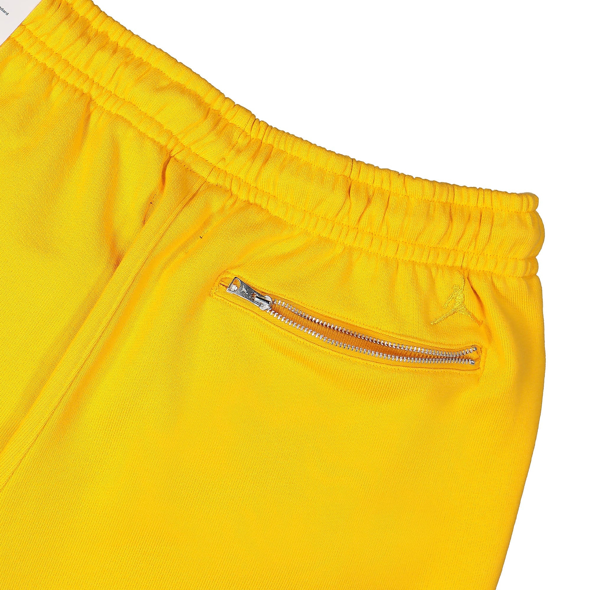 Jordan Air Jordan Wordmark Fleece Pant University Gold Sweat & Track Pants Detail view 1 | Overkill