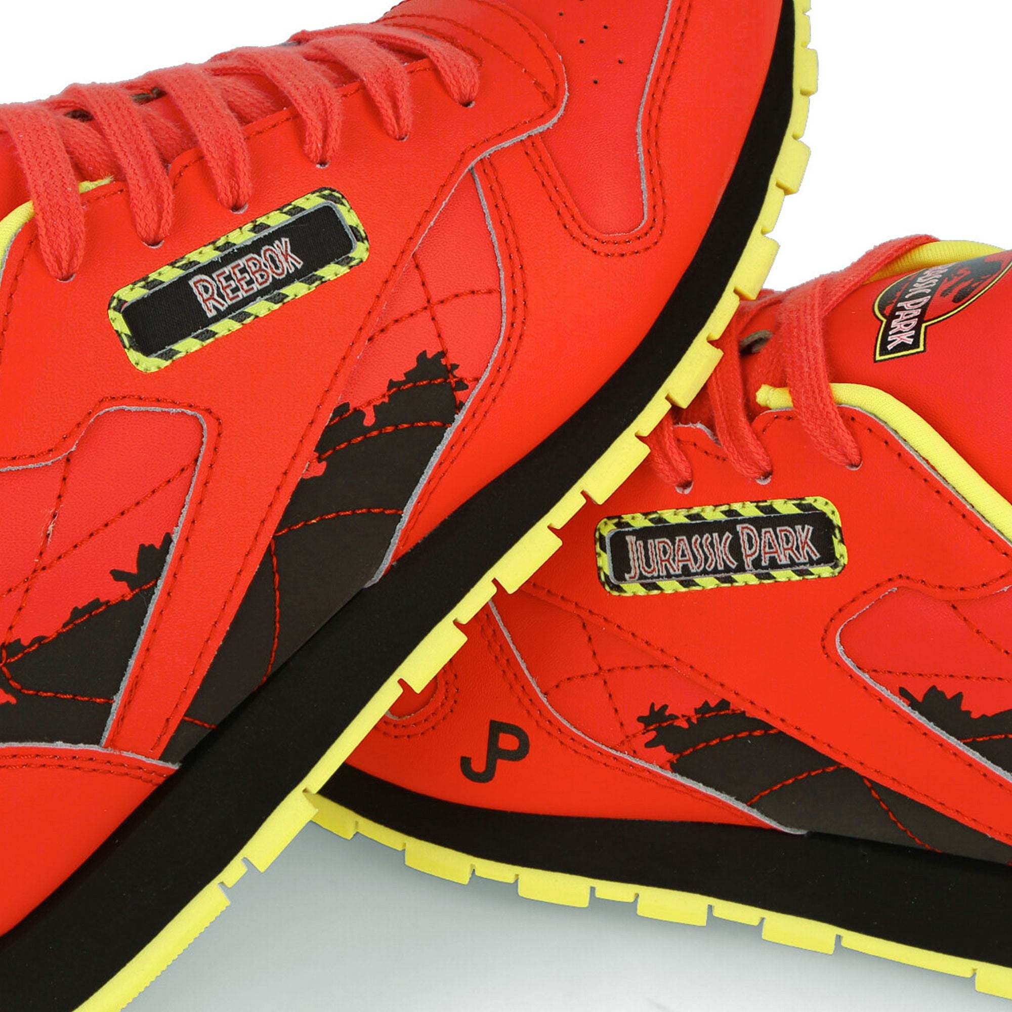 Reebok Jurassic Park x Reebok Classic Leather Junior Radiant Red-Coal-Blaze Yellow Sneakers Detail View 1 | Overkill