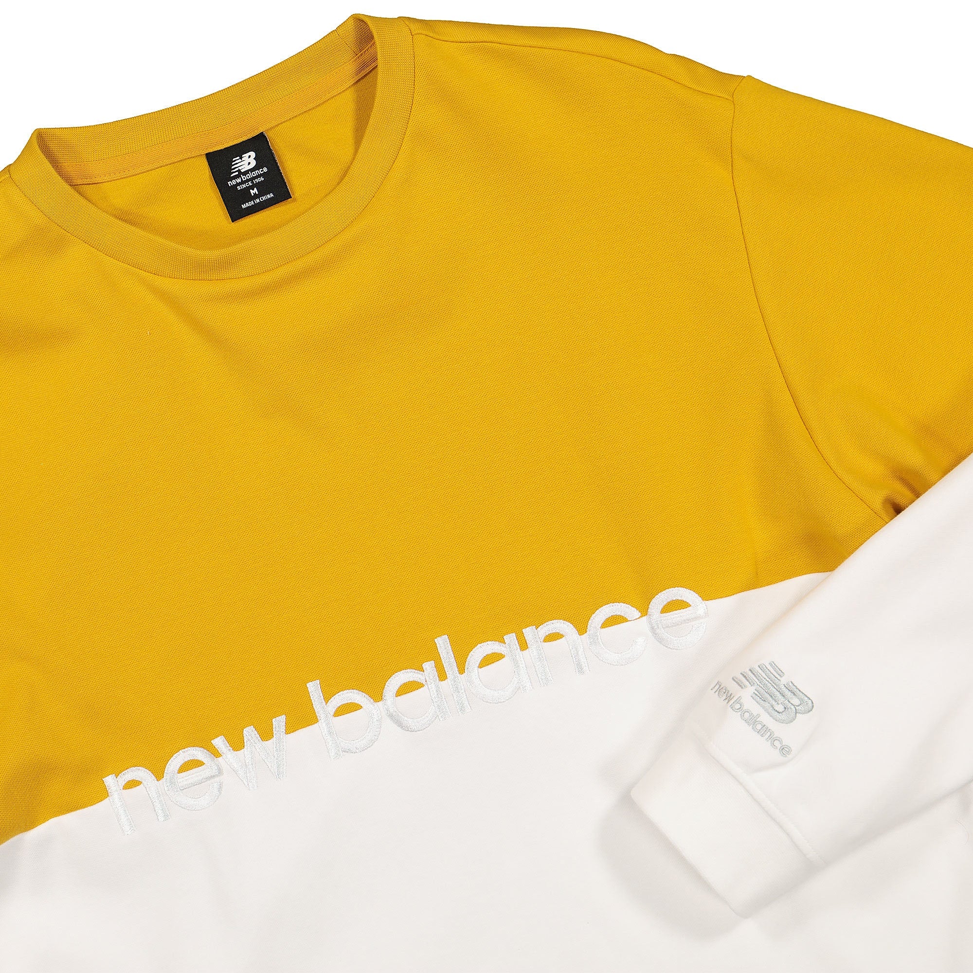 New Balance Athletics Pique Stripe Long Sleeve Varsity Gold / White Longsleeves Close-up | Overkill