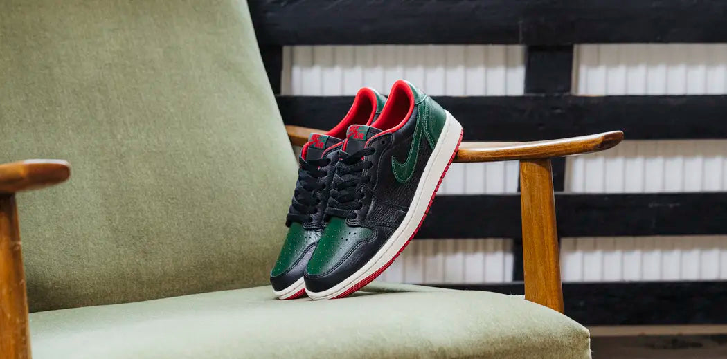 Stylish women's basketball sneakers in pink and white colorway.