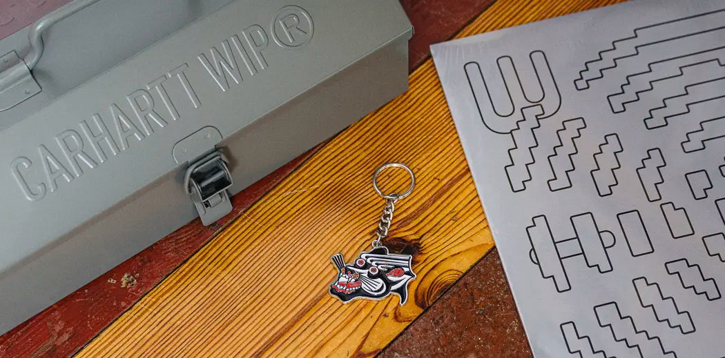 Chic women's accessories like purses, umbrellas, keychains, and phone cases.