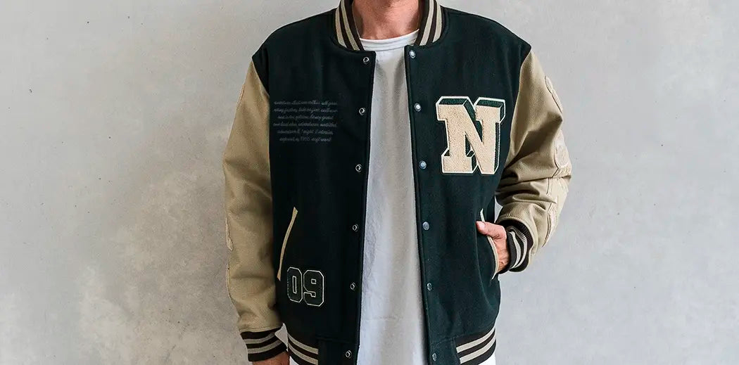 Image of a man wearing a quilted jacket adorned with a map pattern from thisisneverthat.