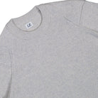 C.P. Company Lambswool GRS Crewneck Lens Sweater Off White Melange Sweatshirt 19CMKN707A-110149A M13 Detailfoto | Overkill
