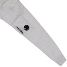 C.P. Company Lambswool GRS Crewneck Lens Sweater Off White Melange Sweatshirt 19CMKN707A-110149A M13 Detail View 1 | Overkill
