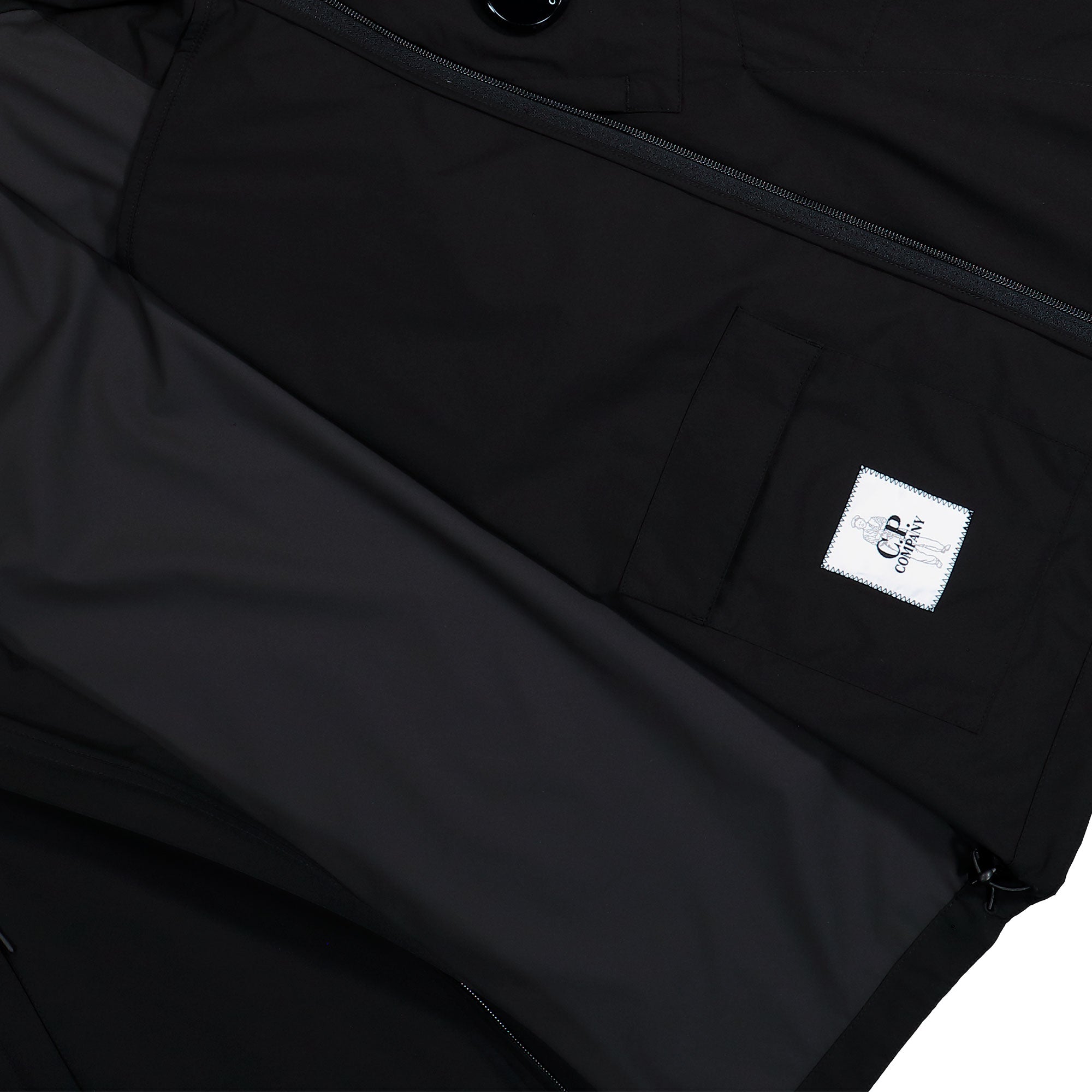 C.P. Company Pro-Tek Hooded Lens Jacket Black Jacket 20CMOW011A-110264A 999 Detail View 2 | Overkill
