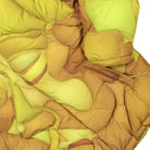 Kidsuper Studios Kissing Puffer Jacket Gold Puffer Jackets Detailfoto | Overkill