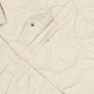 Nike W Quilted Trenchcoat Light Orewood Brown / Sail Coats Detail view 1 | Overkill