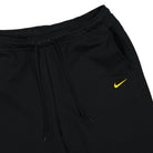 Nike NOCTA x Nike Tech Fleece Open Hem Sweatpants Black / University Gold Sweat & Track Pants Detailfoto | Overkill