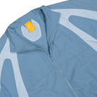 NOCTA x Nike Woven Track Jacket Work Blue / Chambray Blue / Polar Track Top FN7666 486 Detailfoto | Overkill
