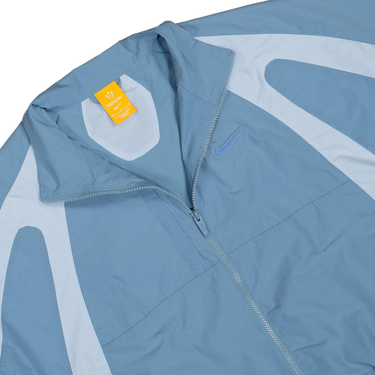 NOCTA x Nike Woven Track Jacket Work Blue / Chambray Blue / Polar Track Top FN7666 486 Detailfoto | Overkill
