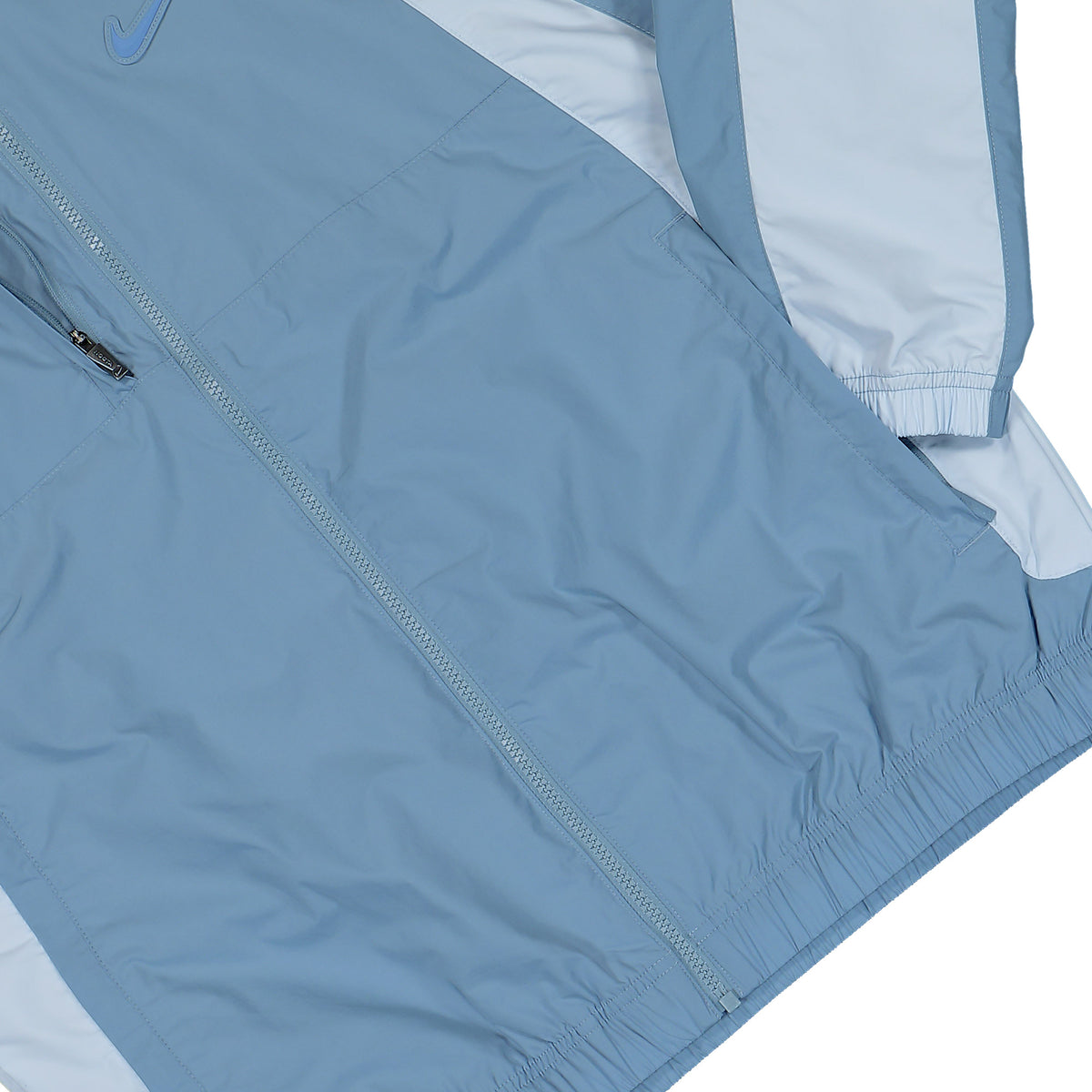 NOCTA x Nike Woven Track Jacket Work Blue / Chambray Blue / Polar Track Top FN7666 486 Detail View 1 | Overkill
