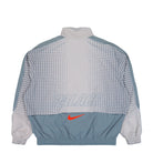 Palace x Nike FA England Track Jacket Pewter Grey / Cool Grey / Bright Crimson Track Jackets IM3201 052 Close-up | Overkill
