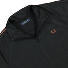 Fred Perry Contrast Tape Track Jacket Black / Whiskey Brown Track Jackets Close-up | Overkill