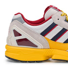 adidas Arsenal FC ZX 7300 SPZL F.C. Crystal White / Crystal White / Aurora Ink Low Top Sneakers KK0761 Detail View 1 | Overkill
