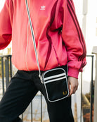 Fred Perry  Classic Small Side Bag Black / Ecru Shoulder & Cross Body Bags L1179-D57 On Model View 1 | Overkill
