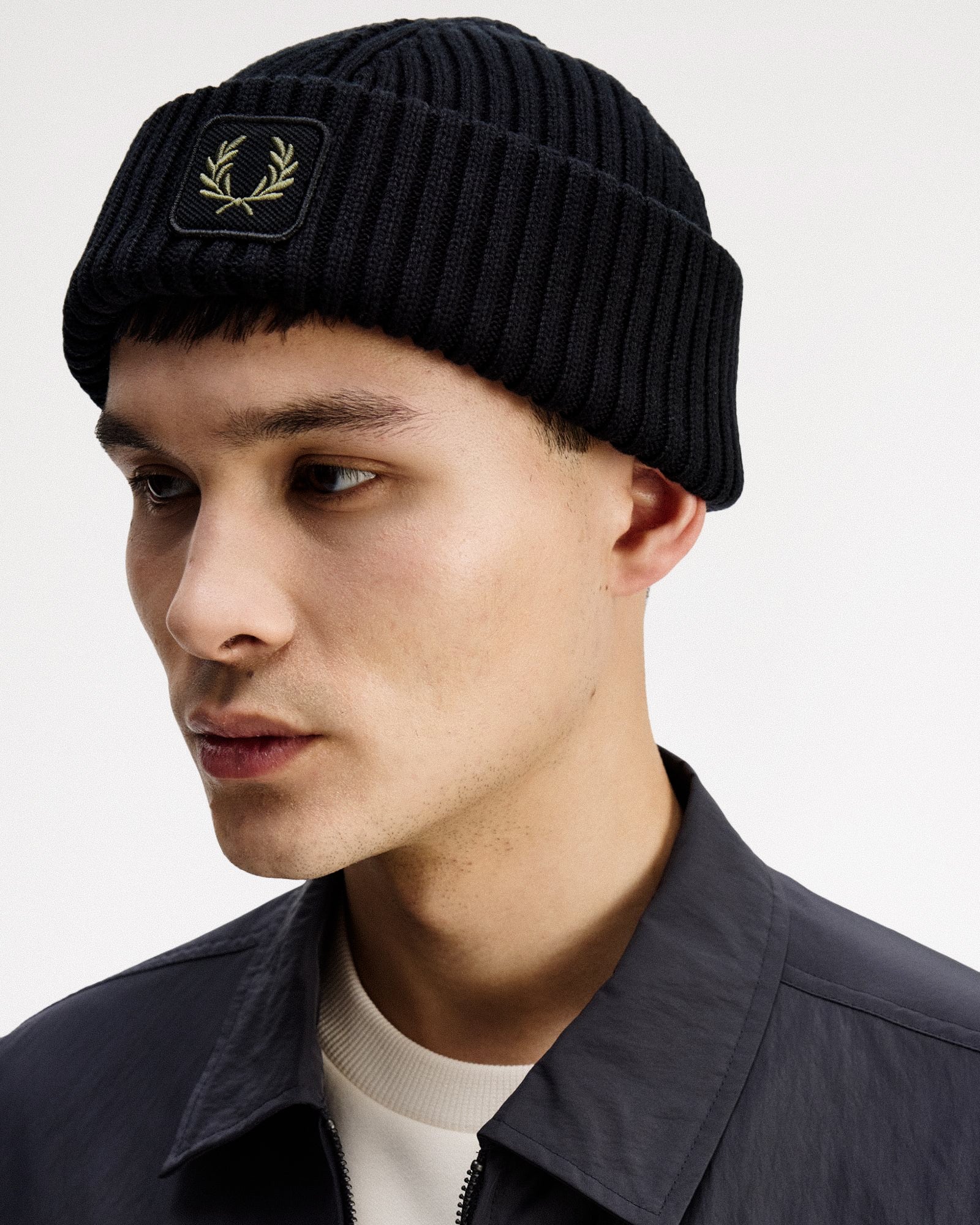 Fred Perry Cotton Ribbed Beanie Black Beanies C1138-102 On Model Front View | Overkill
