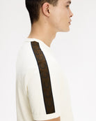 Fred Perry Contrast Tape Ringer T-Shirt Ecru / Burnt Tobacco T-Shirts M4613-42A On Model Back View | Overkill
