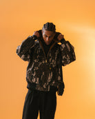 Carhartt WIP 50 Years Anniversary OG Active Jacket Canvas Hamilton Brown / Camo Trebark Jackets I036412.3GK.02.03 On Model Front View | Overkill
