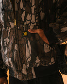 Carhartt WIP 50 Years Anniversary OG Active Jacket Canvas Hamilton Brown / Camo Trebark Jackets I036412.3GK.02.03 Model Detail 1 | Overkill
