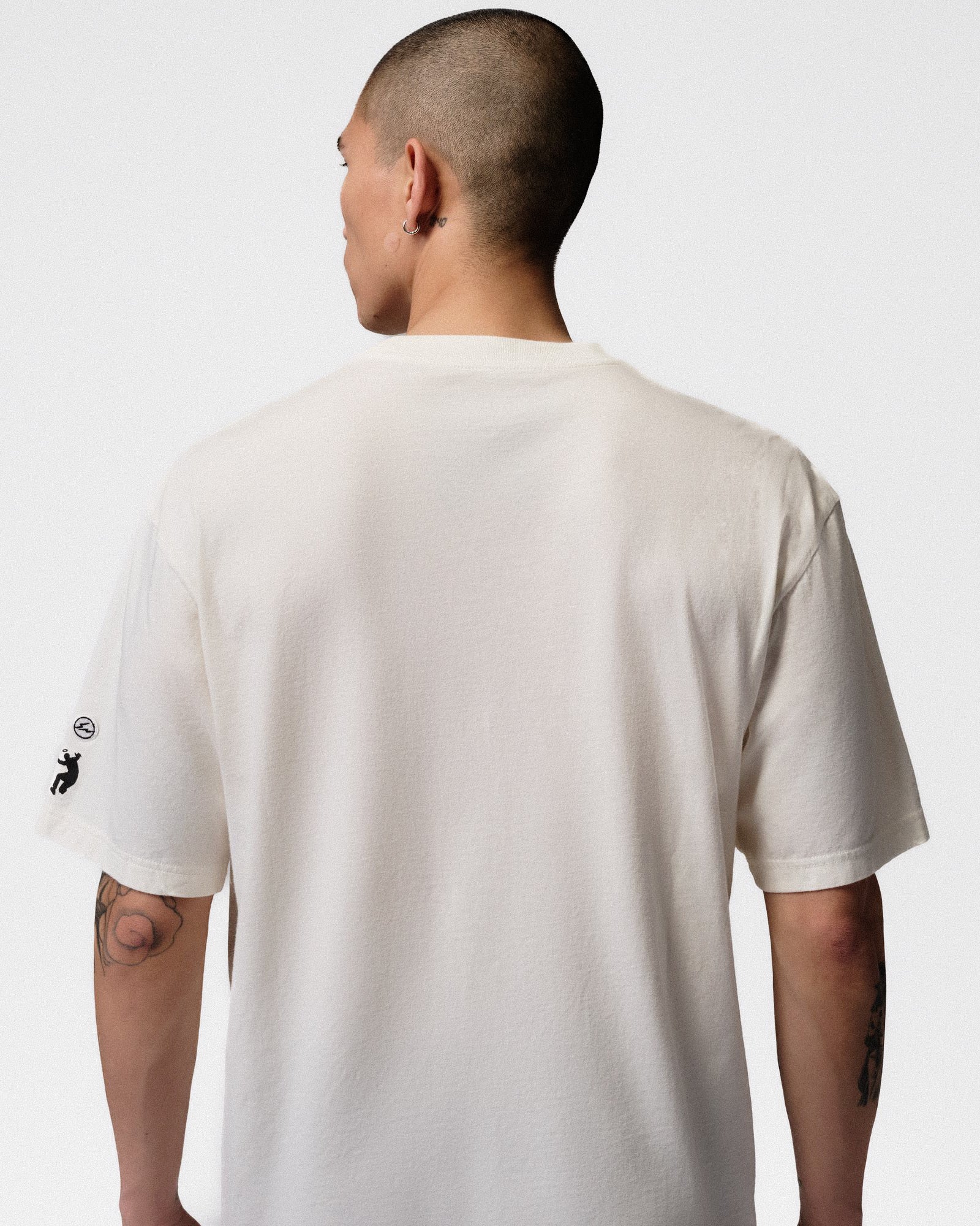 Fragment x Union x Jordan Tee Pale Ivory / Ivory - Black T-Shirts IM6556 110 On Model Back View | Overkill
