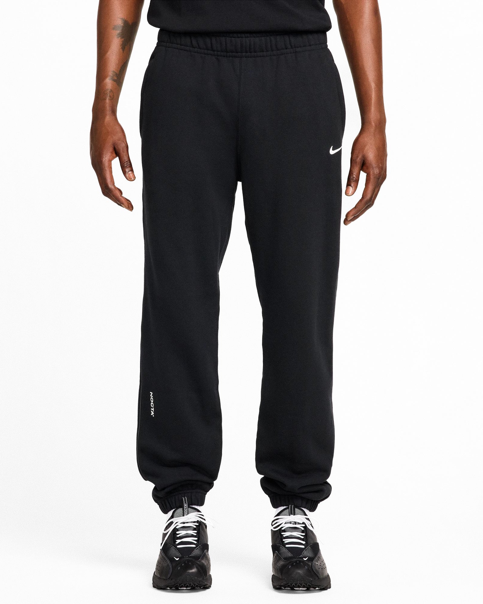 NOCTA x Nike Fleece CS Pant Black / White Sweat & Track Pants HM5764 010 On Model Front View | Overkill
