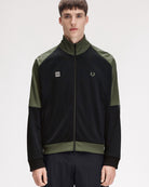 Fred Perry Meyba Taped Raglan Track Jacket Black Track Jackets SJ2166-102 On Model Front View | Overkill
