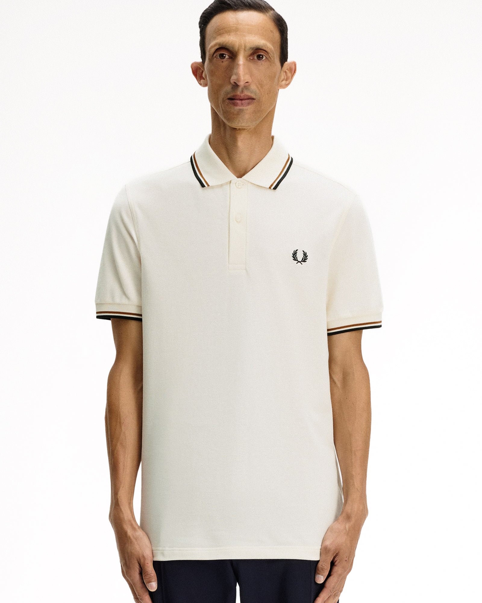 Fred Perry  Twin Tipped Fred Perry Shirt Ecru / Dark Caramel / Black Polo Shirts M3600-79B On Model Front View | Overkill
