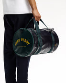 Fred Perry  Classic Barrel Bag Navy / Grassroots Duffle Bags L7255-83A On Model View 2 | Overkill
