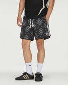 Clot by Edison Chen x adidas Ikat Shorts Carbon Shorts KE7073 On Model Front View | Overkill
