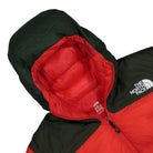 The North Face Cloud Down Nuptse Jacket Dark Cedar Green / High Risk Red Puffer Jackets Close-up | Overkill
