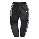 Nike Taped Woven Pant Black / White Sweat & Track Pants AR4942 010 | Overkill