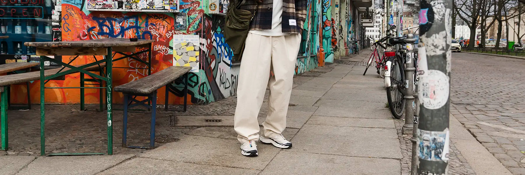 Person on the street wearing Loose pants with sneakers