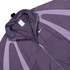 Nike NOCTA x Nike NRG DY Track Jacket Dark Raisin / Daybreak / Cobalt Tint Track Jackets Close-up | Overkill