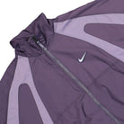 Nike NOCTA x Nike NRG DY Track Jacket Dark Raisin / Daybreak / Cobalt Tint Track Jackets Detailfoto | Overkill