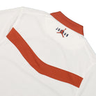 Jordan Eastside Golf x Air Jordan EG Polo White / Burnt Sunrise / Midnight Navy Polo Shirts Detailfoto | Overkill