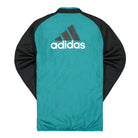 adidas Real Madrid 21/22 Icon Woven Jacket Black / Blast Emerald Jackets Close-up | Overkill